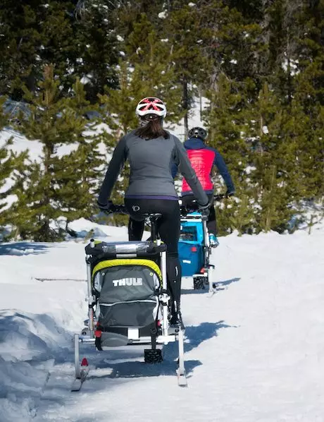 thule trailer on fat bike with thru axle riding in snow